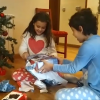 Imagen de niños abriendo sus regalos de Papá Noel